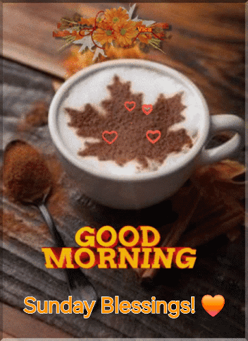 A Good Morning Sunday Blessings Card With A Cup Of Coffee On A Wooden Table GIF