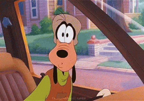 A Goofy Cartoon Character Is Driving A Car GIF