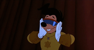 A Goofy Cartoon Character Is Wearing A Superhero Costume And Giving A Thumbs Up GIF
