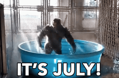 A Gorilla Is Standing In A Blue Tub With The Words It 'S July Written On It GIF