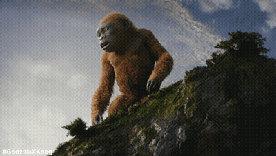 A Gorilla Standing On Top Of A Hill With #Godzillaxkong On The Bottom GIF