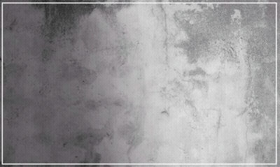 A Gray Concrete Wall With A White Frame In The Middle GIF