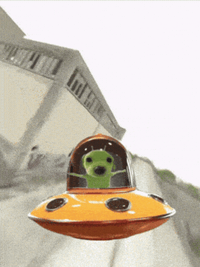 A Green Alien Is Flying In An Orange Ufo GIF