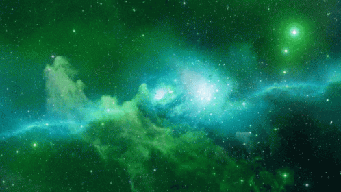 A Green And Blue Galaxy With Lots Of Stars In The Background GIF