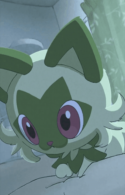 A Green And White Cat With Big Pink Eyes GIF
