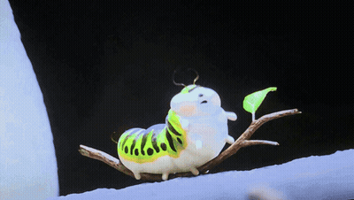 A Green And White Caterpillar Is Sitting On A Branch With A Green Leaf GIF