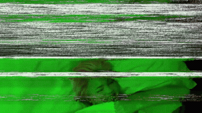 A Green And White Striped Background With A Person Sleeping On It GIF