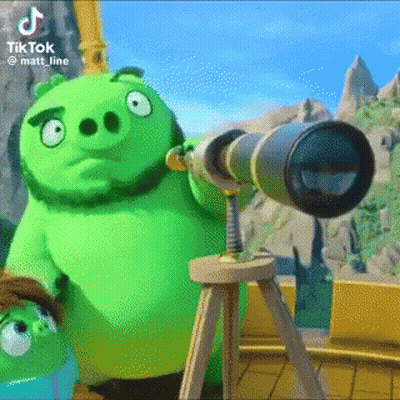 A Green Angry Birds Pig Is Looking Through A Telescope . GIF