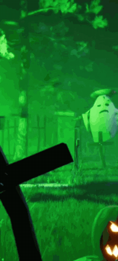 A Green Background With A Pumpkin In The Foreground And A Windmill In The Background . GIF