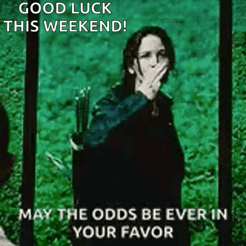 A Green Background With A Woman Covering Her Mouth With Her Hand And The Words Good Luck This Weekend May The Odds Be Ev GIF