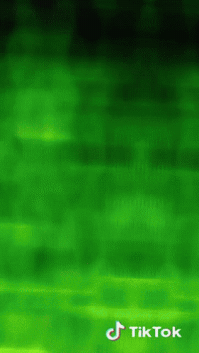 A Green Background With Tik Tok Written On The Bottom GIF