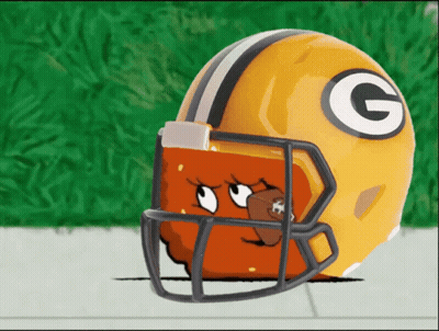 A Green Bay Packers Helmet With A Face On It GIF