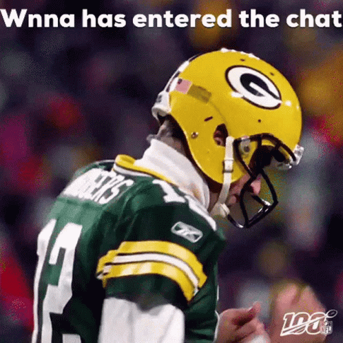 A Green Bay Packers Player Wearing A Yellow Helmet With A G On It GIF