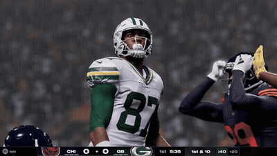 A Green Bay Packers Player Wearing Number 87 GIF