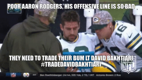 A Green Bay Packers Player With The Number 16 On His Jersey Is Being Helped By Another Player GIF