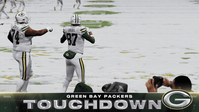 A Green Bay Packers Touchdown Poster With Two Players GIF