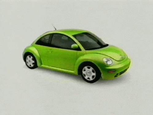 A Green Beetle Car Is Driving On A White Background . GIF