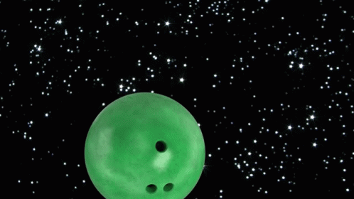 A Green Bowling Ball Next To A Blue Earth GIF