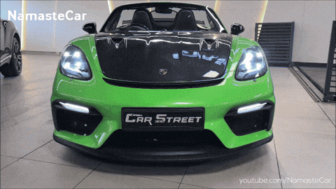 A Green Car With The Word Car Street On The Front Of It GIF