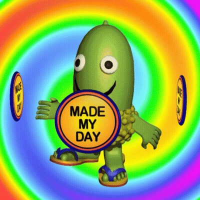 A Green Cartoon Character Holding A Circle That Says Made My Day GIF