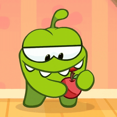 A Green Cartoon Character Is Holding A Red Apple In His Hand GIF