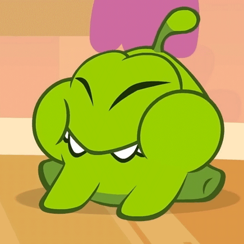 A Green Cartoon Character Is Sticking Out His Tongue GIF