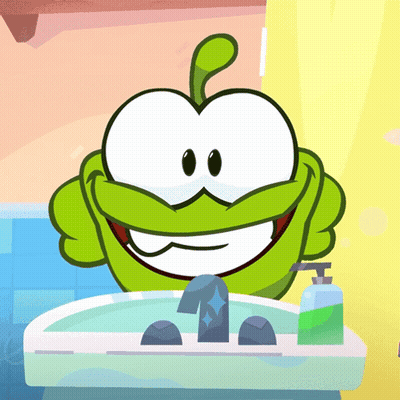 A Green Cartoon Character Is Washing His Hands In A Bathroom Sink GIF