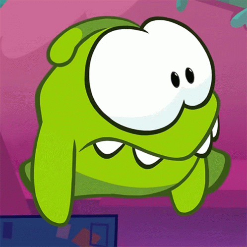 A Green Cartoon Character With Big Eyes And Teeth On A Pink Background GIF