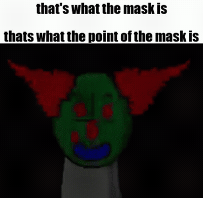A Green Cartoon Character With Red Horns Is Holding A Book And A Mask . GIF