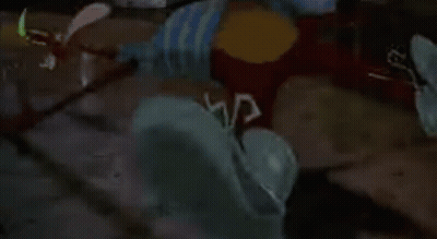 A Green Dinosaur Is Glowing In The Dark In A Dark Room . GIF