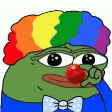 A Green Frog Wearing A Rainbow Wig And A Bow Tie Is Holding A Red Nose . GIF