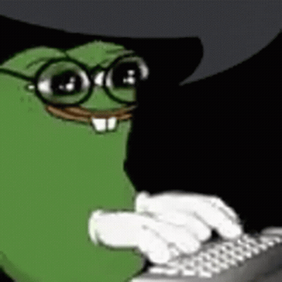 A Green Frog Wearing Glasses And A Black Hat Is Typing On A Laptop . GIF