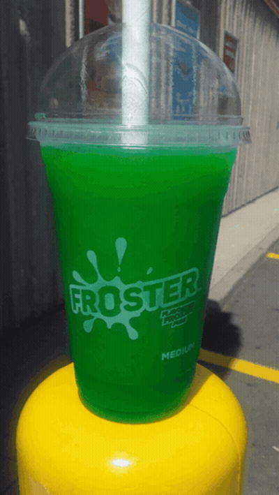 A Green Froster Cup With A Straw In It GIF