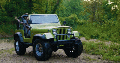A Green Jeep With A License Plate That Says ' Jeep ' On It GIF