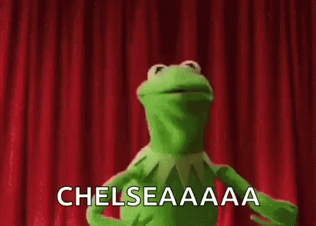 A Green Kermit The Frog Is Dancing In Front Of A Red Curtain And Says Chelseaaaa . GIF