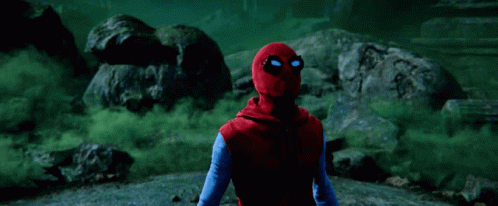 A Green Light Is Shining On A Man And Woman GIF