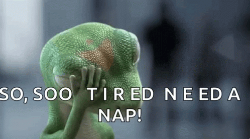 A Green Lizard Is Covering Its Face With Its Hands And The Words So Soo Tired Need A Nap GIF