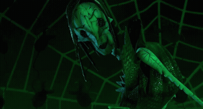A Green Mask With The Words You 'Re Going To Stay Here Forever GIF