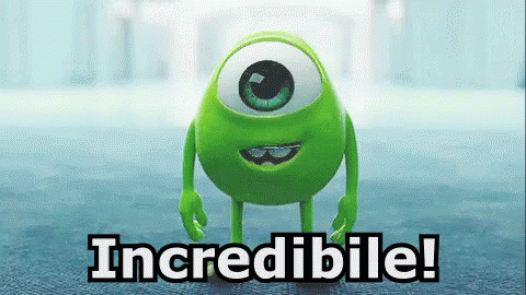 A Green Monster From Monsters Inc Is Standing In Front Of A Sign That Says Incredible GIF