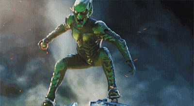 A Green Monster Is Standing On A Blue Object GIF