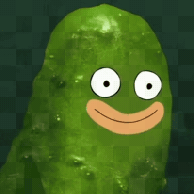 A Green Pickle With A Cartoon Face On It 'S Face . GIF
