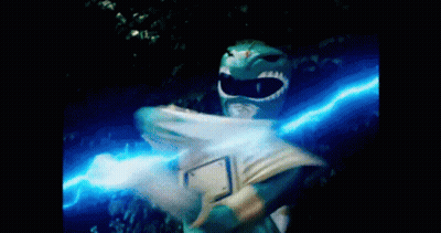 A Green Power Ranger Is Holding A Blue Light In His Hands GIF