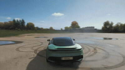 A Green Sports Car With A License Plate That Says ' A ' GIF