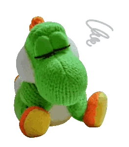 A Green Stuffed Animal With A White Background And The Word " Free " Written On It Sticker