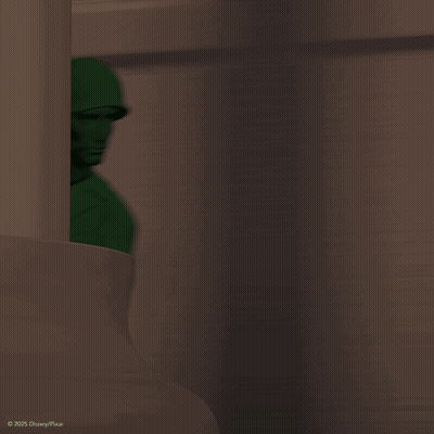 A Green Toy Soldier From Disney Pixar Is Pointing His Gun GIF