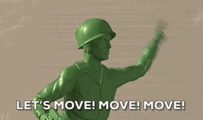 A Green Toy Soldier Says " Let 'S Move Move Move " GIF