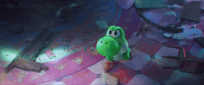 A Green Yoshi Toy Is Standing On A Checkered Floor . GIF