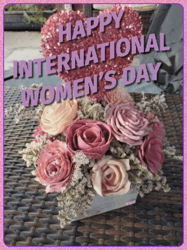 A Greeting Card For International Women 'S Day With A Heart Made Of Flowers GIF