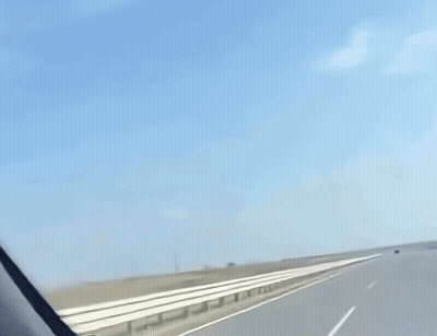 a grim reaper is holding a scythe while riding a motorcycle
