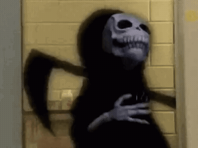 A Grim Reaper With A Scythe Is Standing Next To A Door . GIF